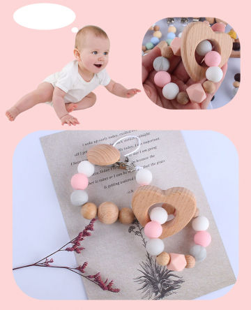 Speenkoord en bijtringarmband hartje wit roze